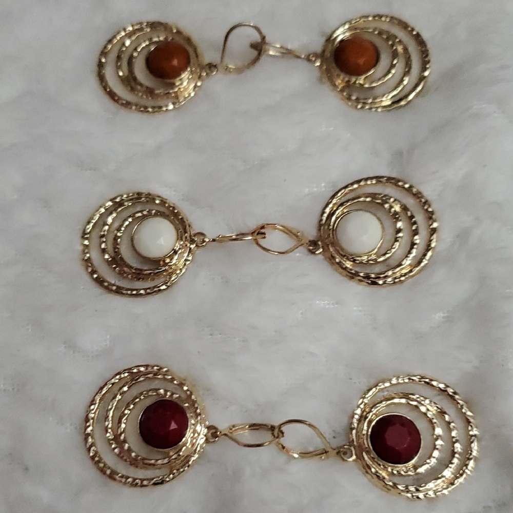 Three Pair Of Gold Tone Earrinsgs With Acrylic Centers
